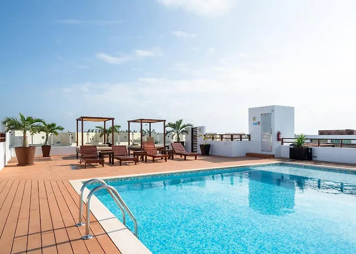 Vakantiehuis Casa del Mar Beachside Condo with Rooftop Pool - Clara Playa del Carmen