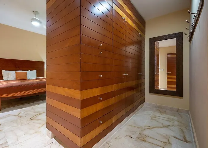 Vakantiehuis Casa del Mar Beachside Condo with Rooftop Pool - Clara Playa del Carmen